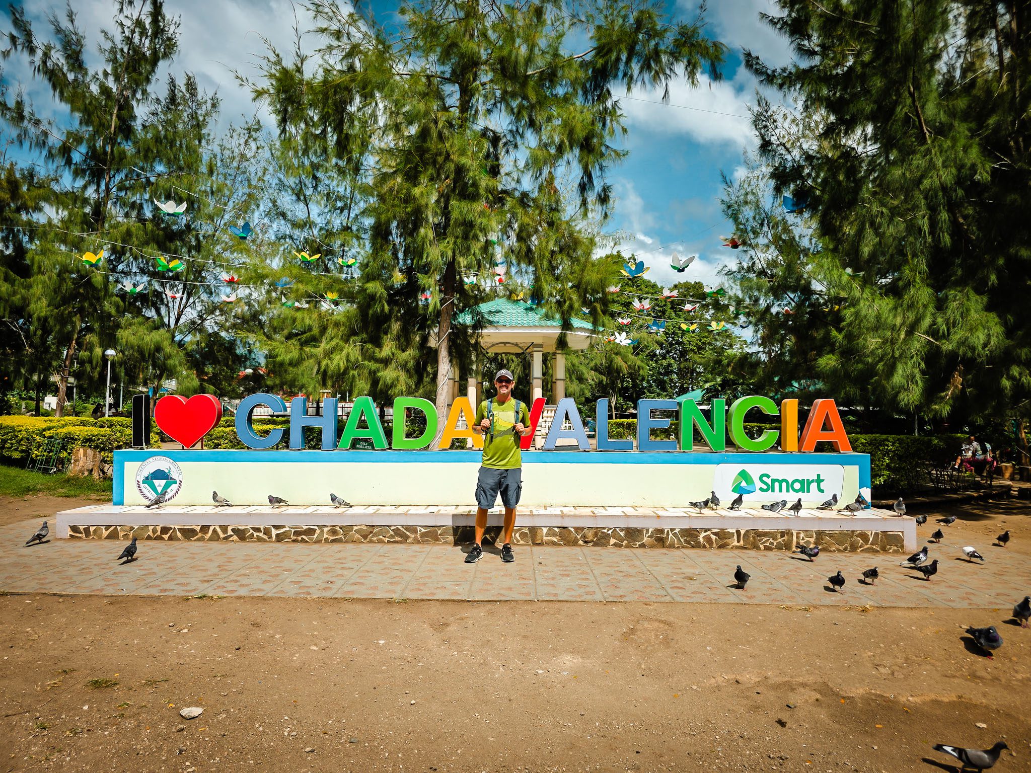 Colorful "I Love Chada Valencia" sign in Dumaguete, Philippines park setting.